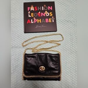 Steve Madden Chic Black Crossbody Bag with Gold Accents